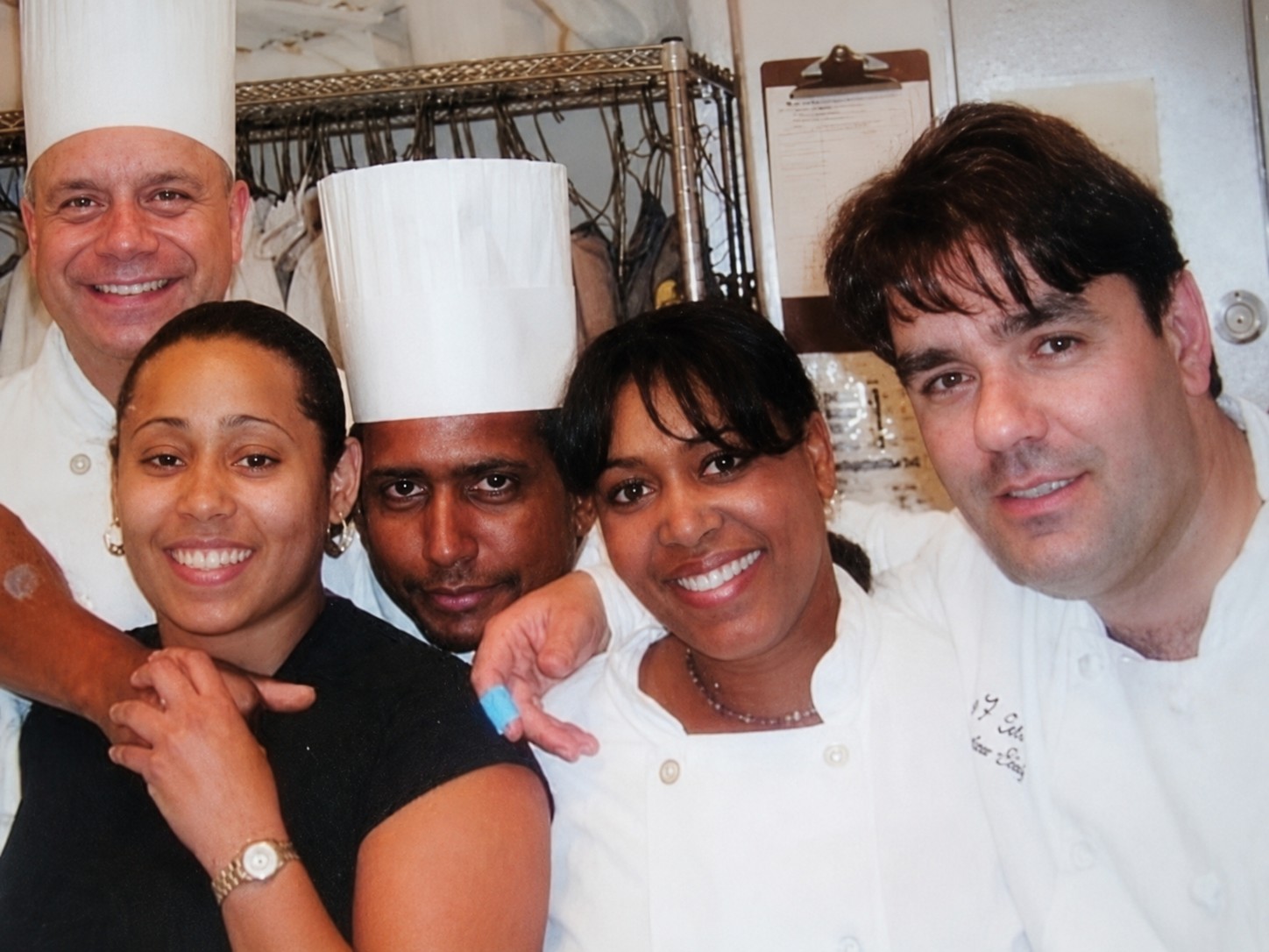 Maria Mosquera with kitchen colleagues during her restaurant years.